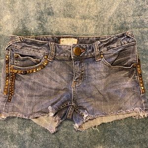 Vintage Free people low cut denim shorts with gold studs